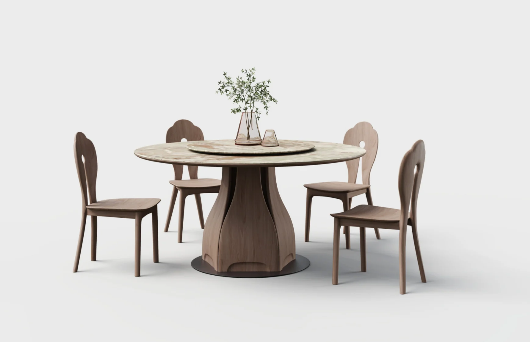 Round dining table and chairs in a supplied dining-room scene